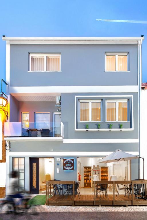 Imagem de 9/4 Nove Quartos Alojamento Local