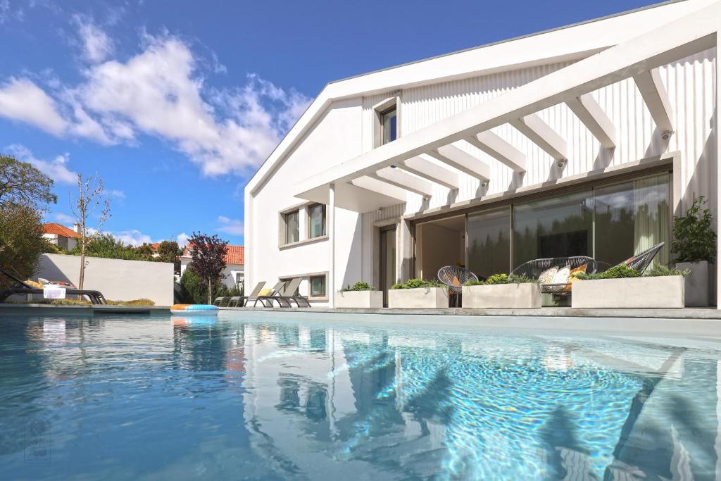 Imagem de BONITA CASADE HÓSPEDES COM PISCINA E JARDIM
