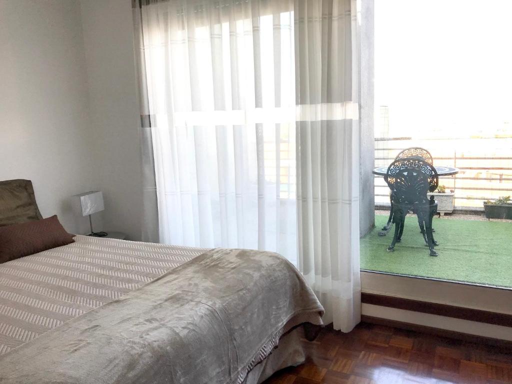 Imagem de JARDIM NA PRAIA APARTMENT